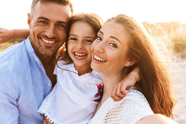 A smiling family in Ogdensburg, New York.